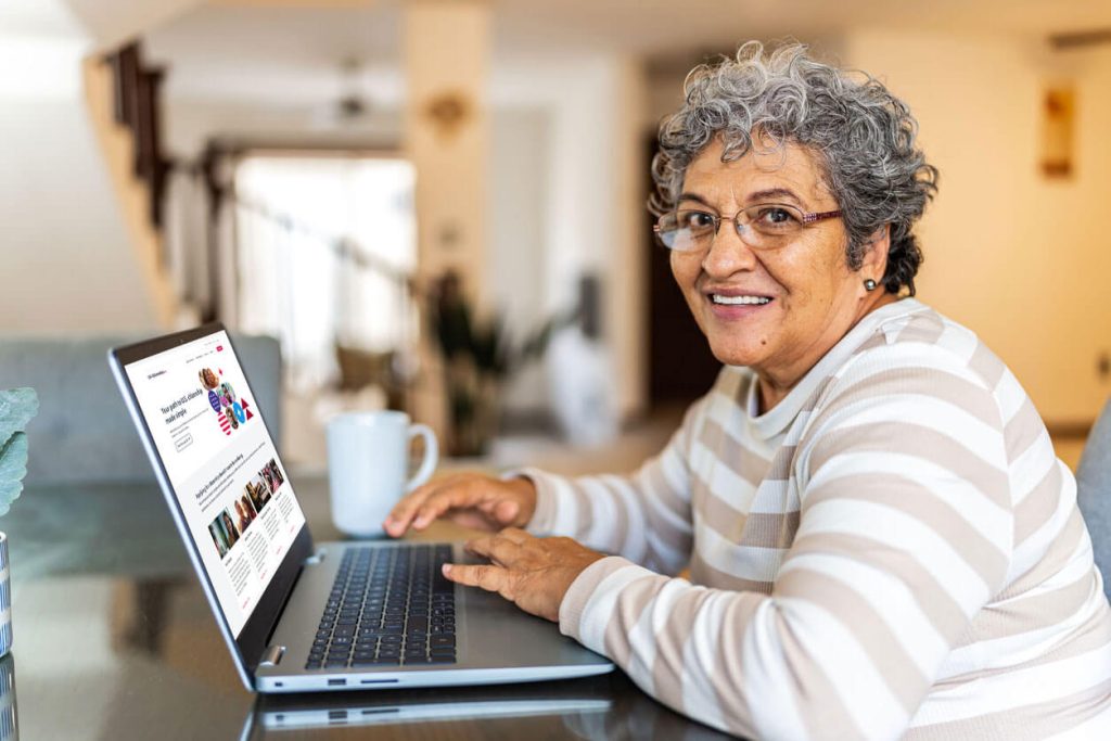 senior woman using laptop